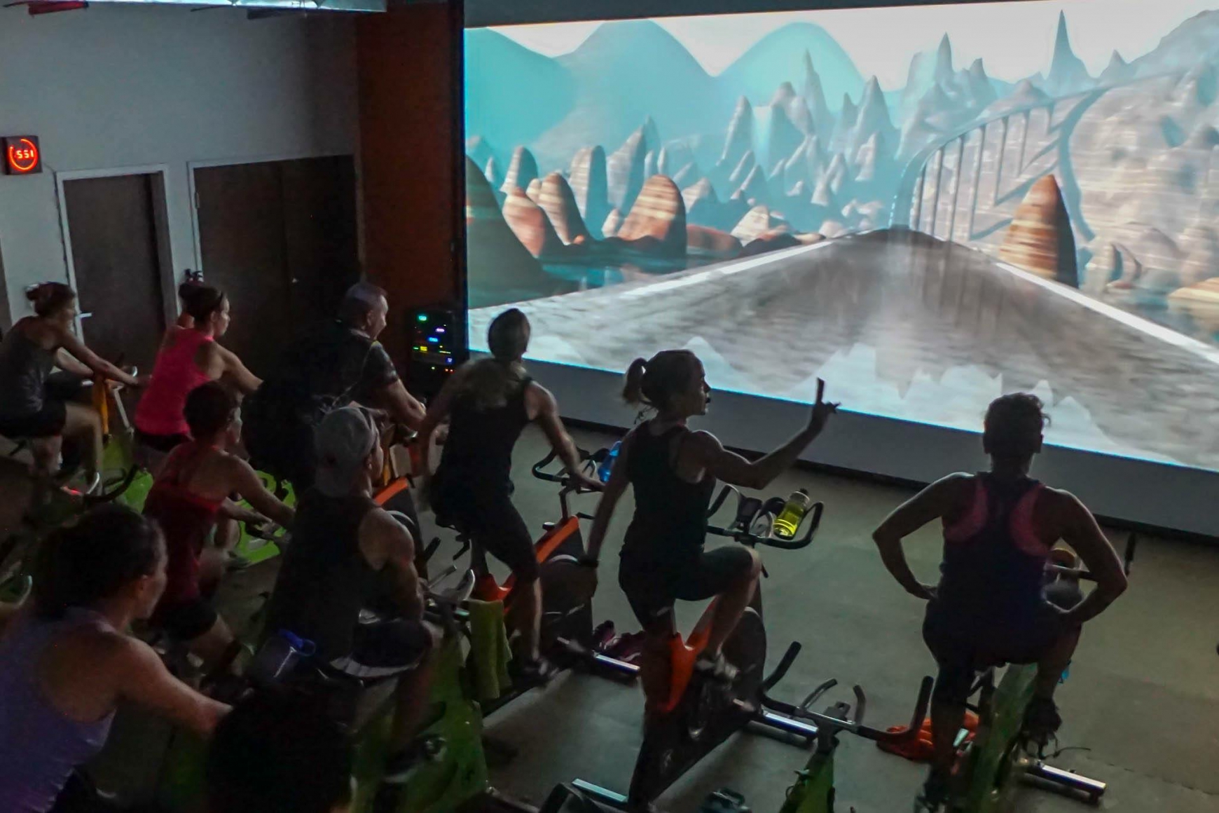 Indoor Cycling Studio Uses Theatre Size Animation To Make The within Amazing and also Gorgeous cycling studio regarding  Property